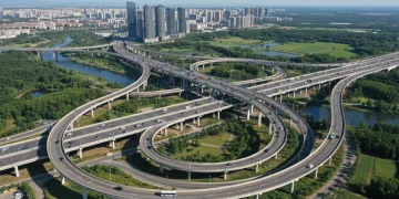 Modern highway interchange symbolizing infrastructure investment and job growth in 2026.